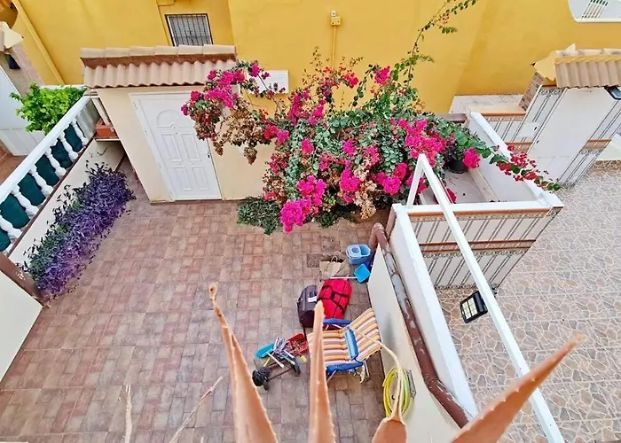 En primera línea de mar, casa,patio solarium La Bugamvulla Apartamento